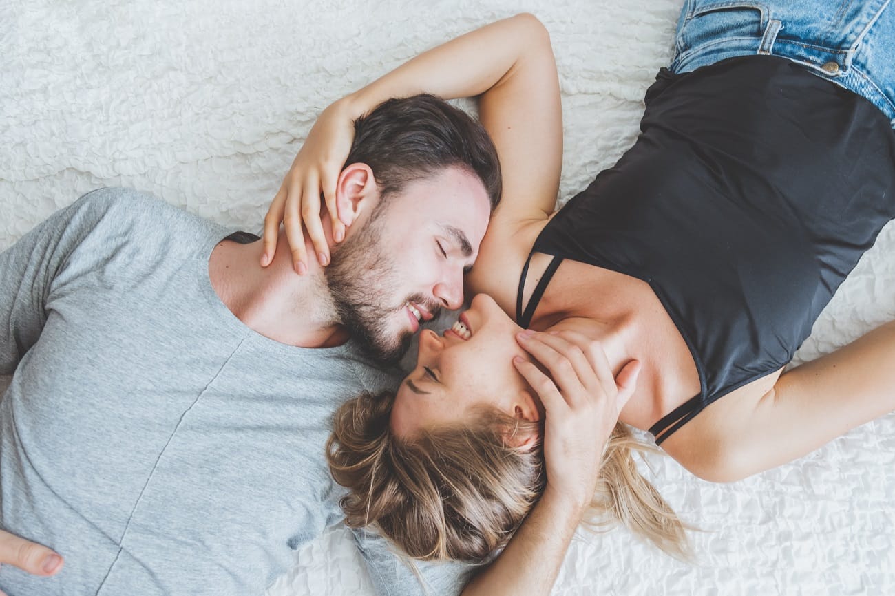 Happy couple lover on bed